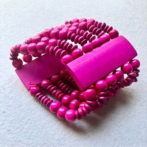 Wooden stretch bracelet in bright pink